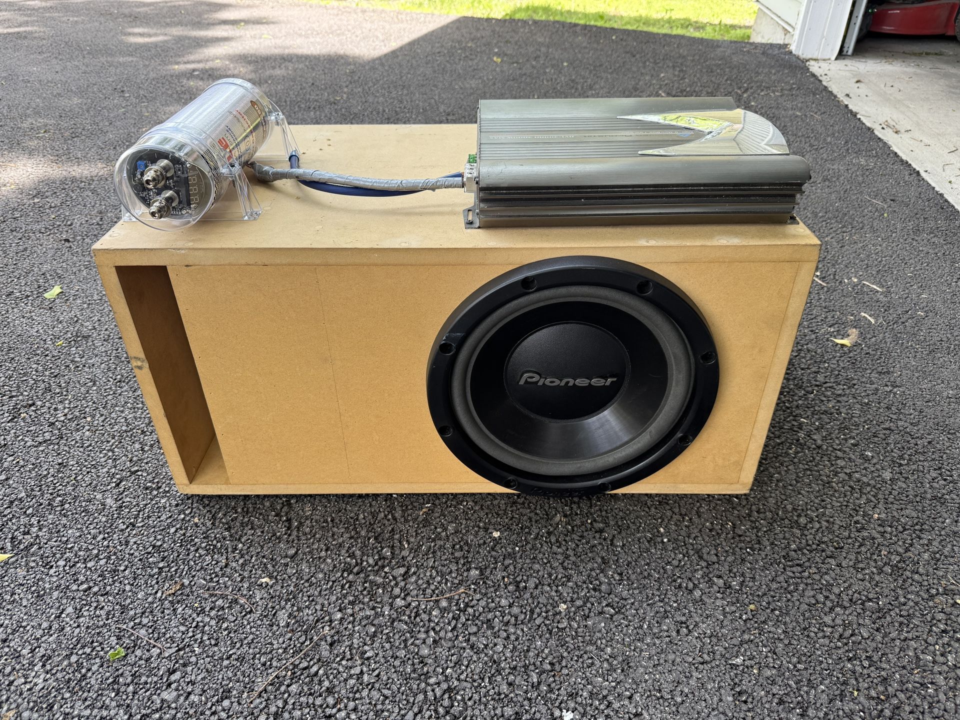 Subwoofer Box, Amp and Capacitor.