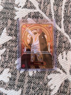 Shanks - OP09-004 (SP) (Gold)