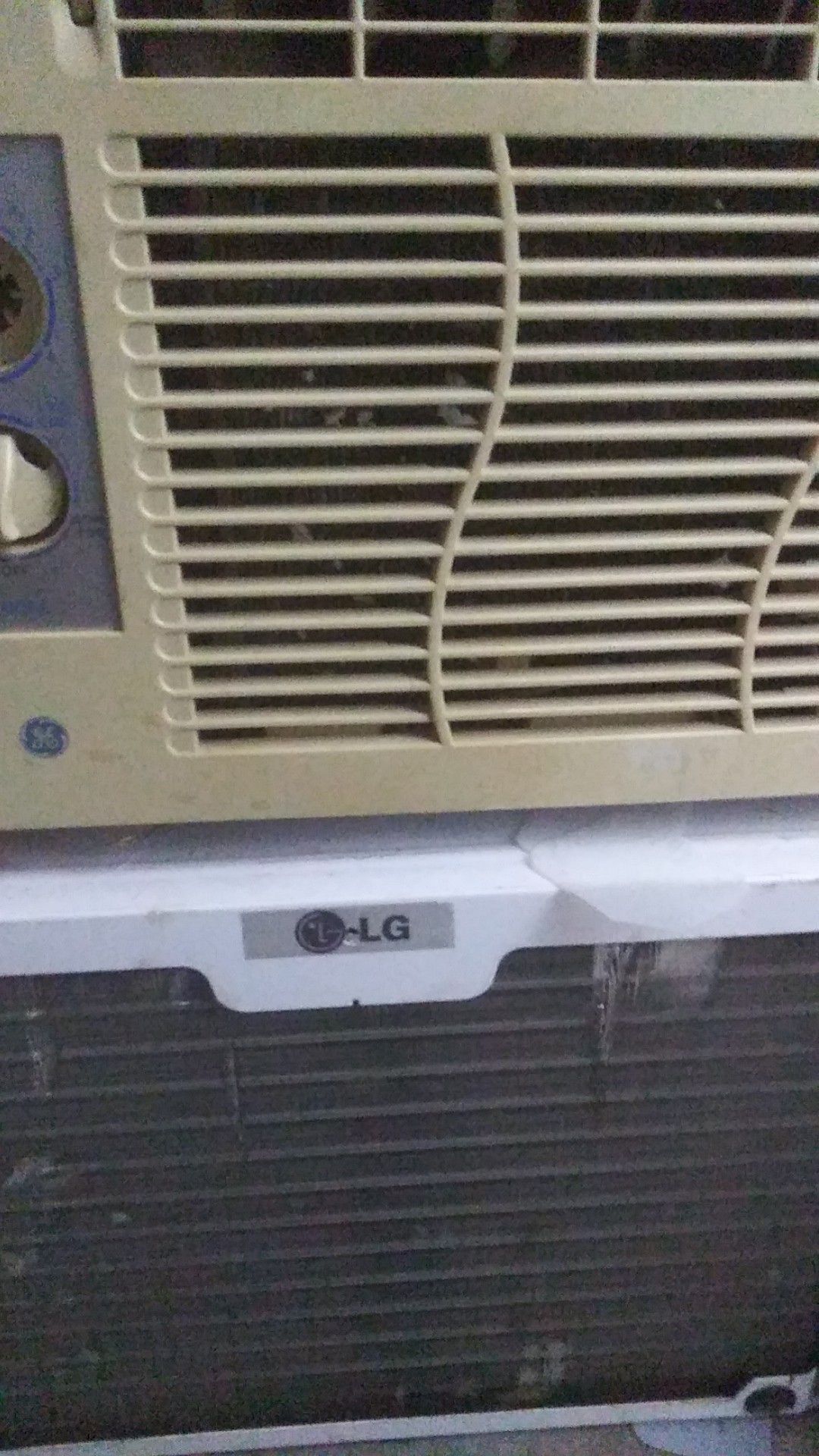 Two window unit AC . blows ice cold