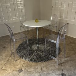 Table With Plexi Glass Chairs