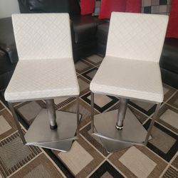 Two  white  bar 🍸  chairs, 