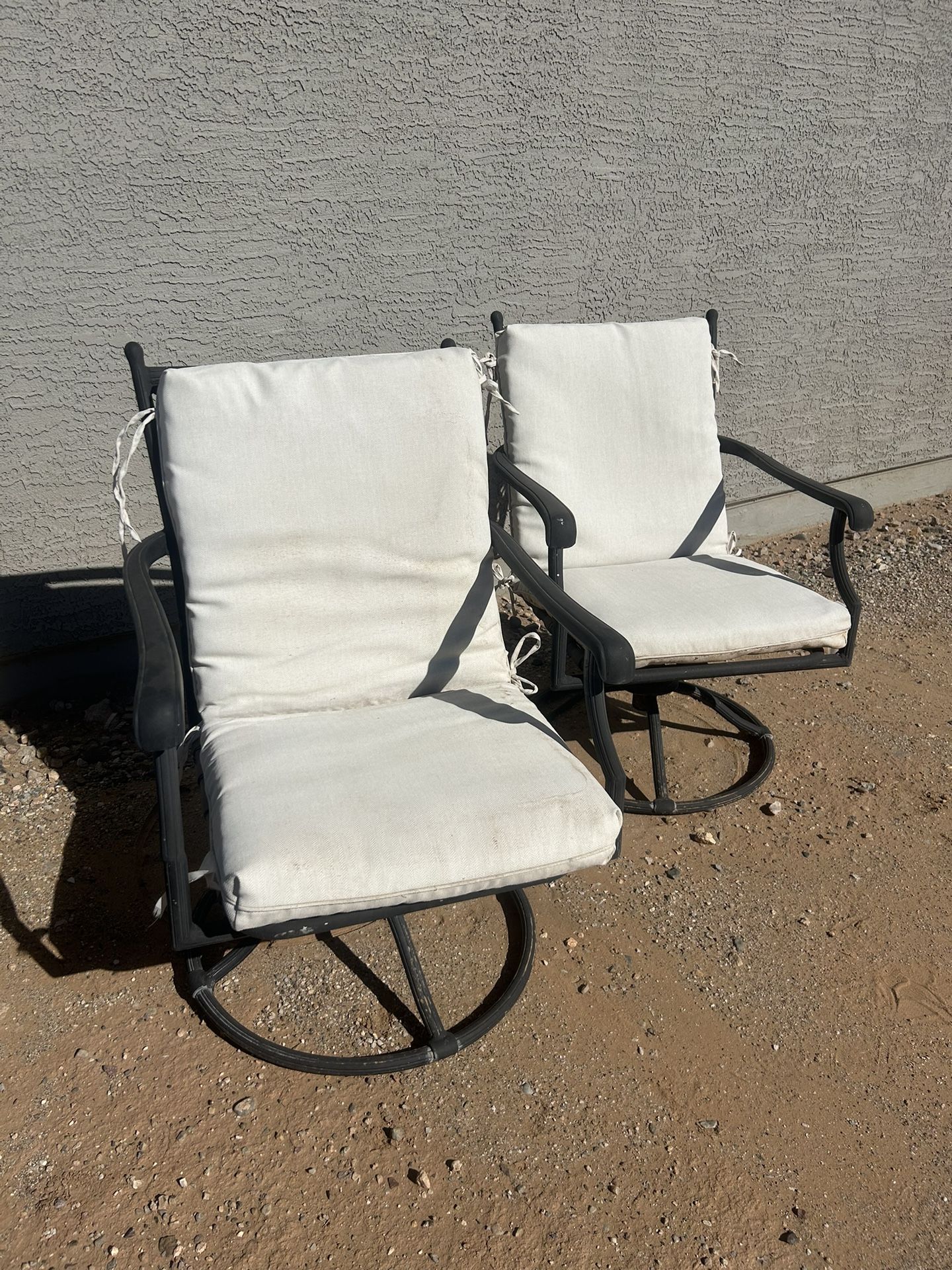 Two Chairs With Tie On Cushions