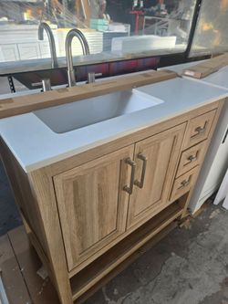 36inch wood vanity with faucet and marble top