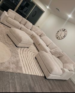Couch and rug and ottoman