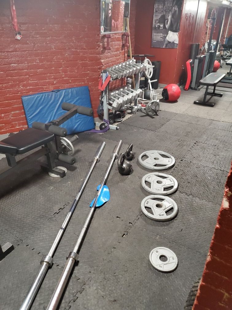 45 Pound Olympic Bar(2) 1 Ez Curl Bar all for $50.00