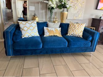 Navy blue velvet couch and matching chairs
