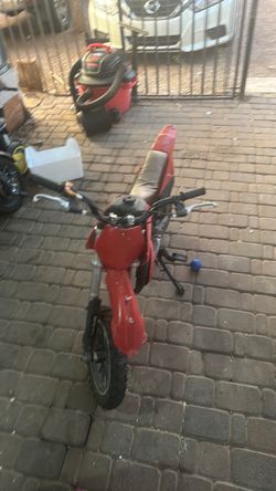 Red 50cc dirt bike