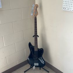 SQUIER BY FENDER ELECTRIC JAGUAR BASS GUITAR.