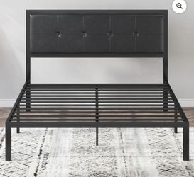 Full-size bed with mattress in an excellent condition
