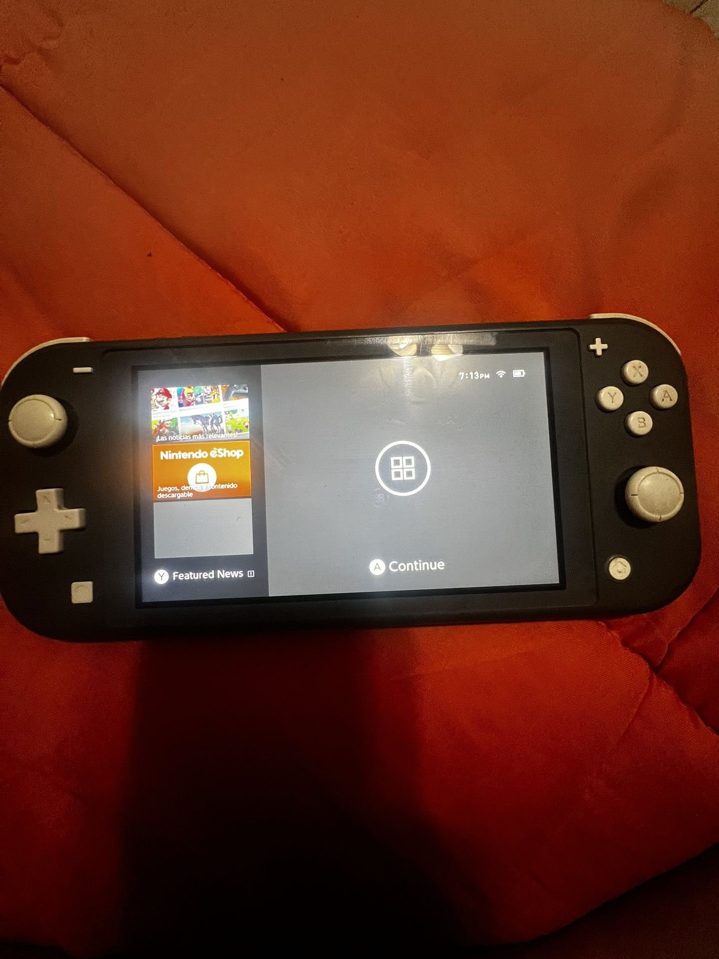 Nintendo Switch Lite ( I Added 128gb More)