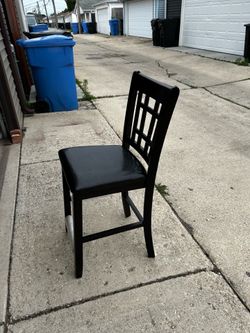 4 Coaster black tall chairs