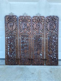 4. Vintage hanging carved decor
