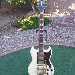 SG Style HHH Jay Turser Guitar with Bigsby and onboard distortion pedal
