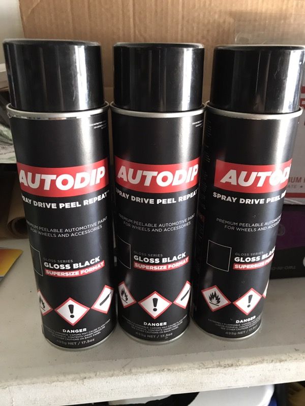 Autodip gloss black peelable paint wheels and trim