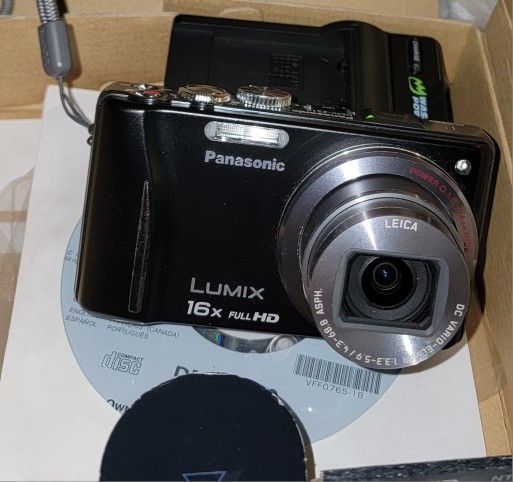 Panasonic Lumix DMC-ZS10 14.1 MP Digital Camera GPS iA 3D Box digicam