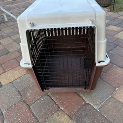 Cage For Dogs And Cats 21 Inches Wide,22 Inches High And 27 Inches Long.