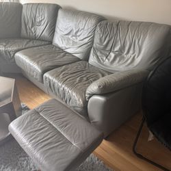 L shaped leather couch & footrest