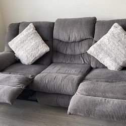 Three Sitter Recliner Couch Grey In Color From Ashley Home store