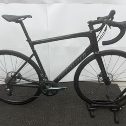 For sale is a 2022 Specialized Tarmac Disc in 58cm (XL) — a modern race-bred carbon road bike engineered for speed, stiffness, and precision handling.