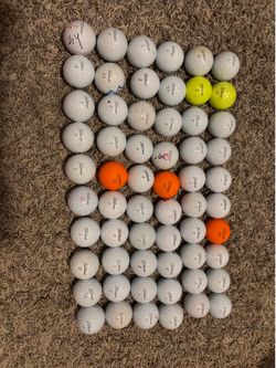 60 used Titleist Golf Balls