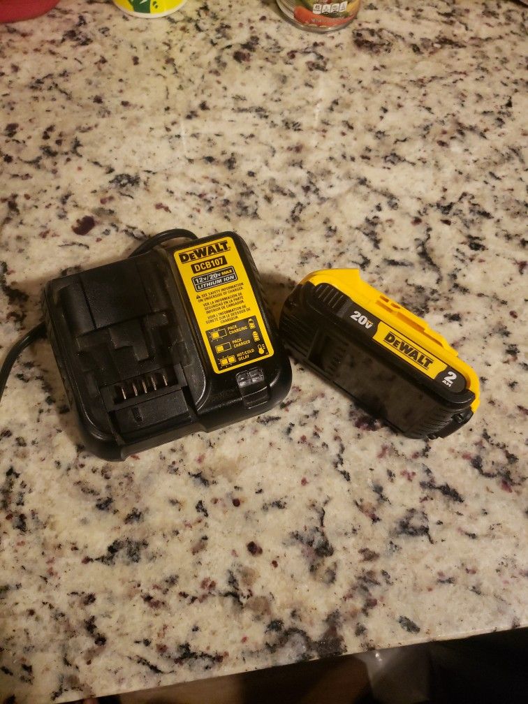 Dewalt Charger And 2ah Battery. Good Condition. 