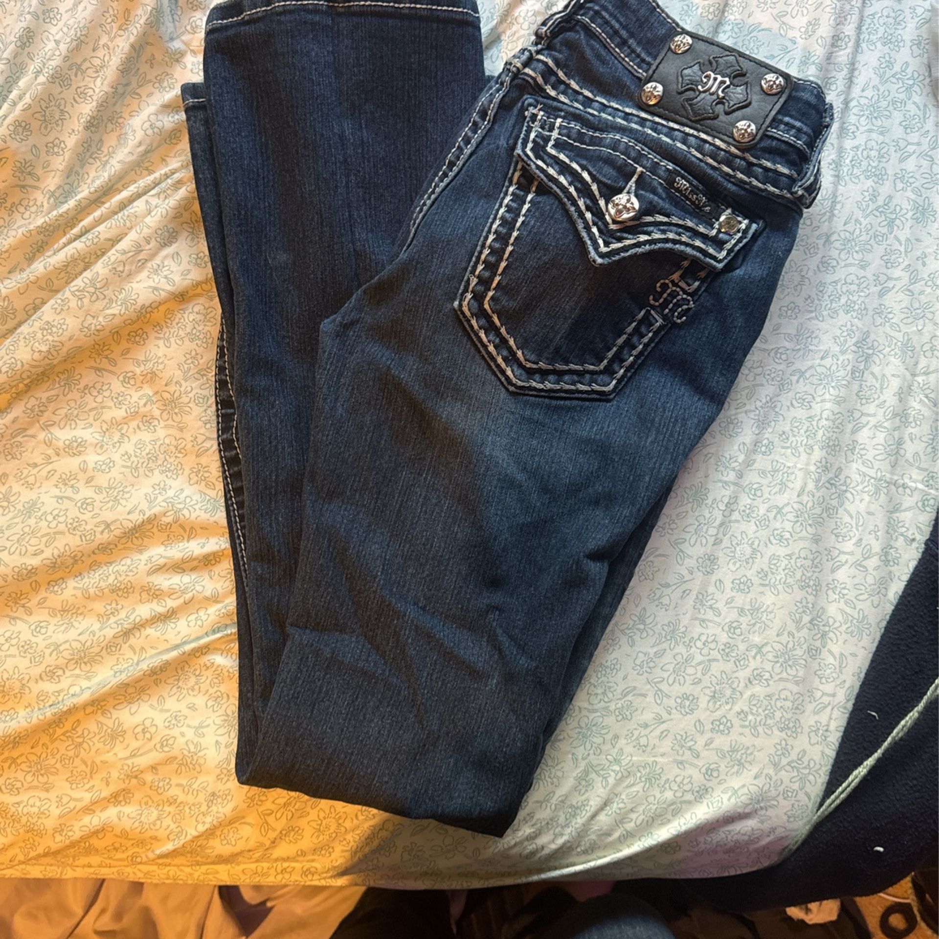 Low rise boot cut miss me jeans size 28