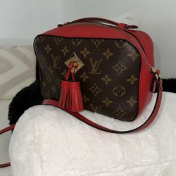 louis vuitton saintonge handbag monogram canvas with leather