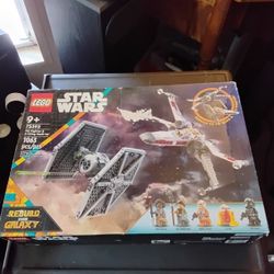 LEGO TIE FIGHTER AND X WING COMBINATION (FACTORY SEALED BUT BOX IS DAMAGED IN PLACES (ONLY $50)