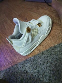 Jordan 4 gold metallic