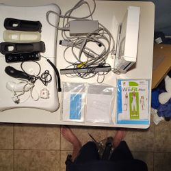 Nintendo Wii Bundle, With Balance Board, All Wires, Controller Covers,  2 Nunchucks  One Controller Instruction Manuals
