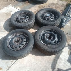 Honda Rims And Tires$100
