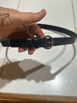 Banana Republic classic black leather belt featuring a polished silver-tone single-prong buckle and