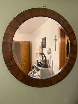 Circular wooden mirror