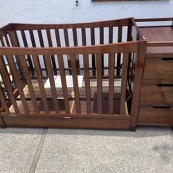 Graco Crib With Attatched Changing Table, Drawers, Shelf And Bottom Drawer