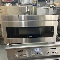 SHARP BRAND NEW MICROWAVE OVEN