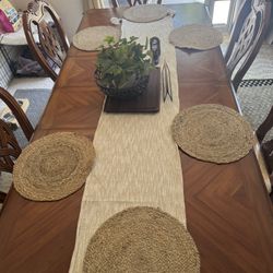 Brown Wood dining table with chairs 