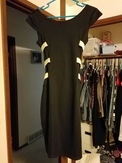 Perfect little black dress with a little extra in back