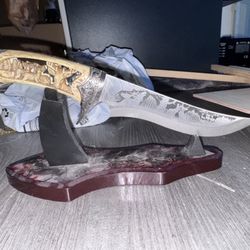 Decorative Hunting Knife with Wildlife Engravings & Stand