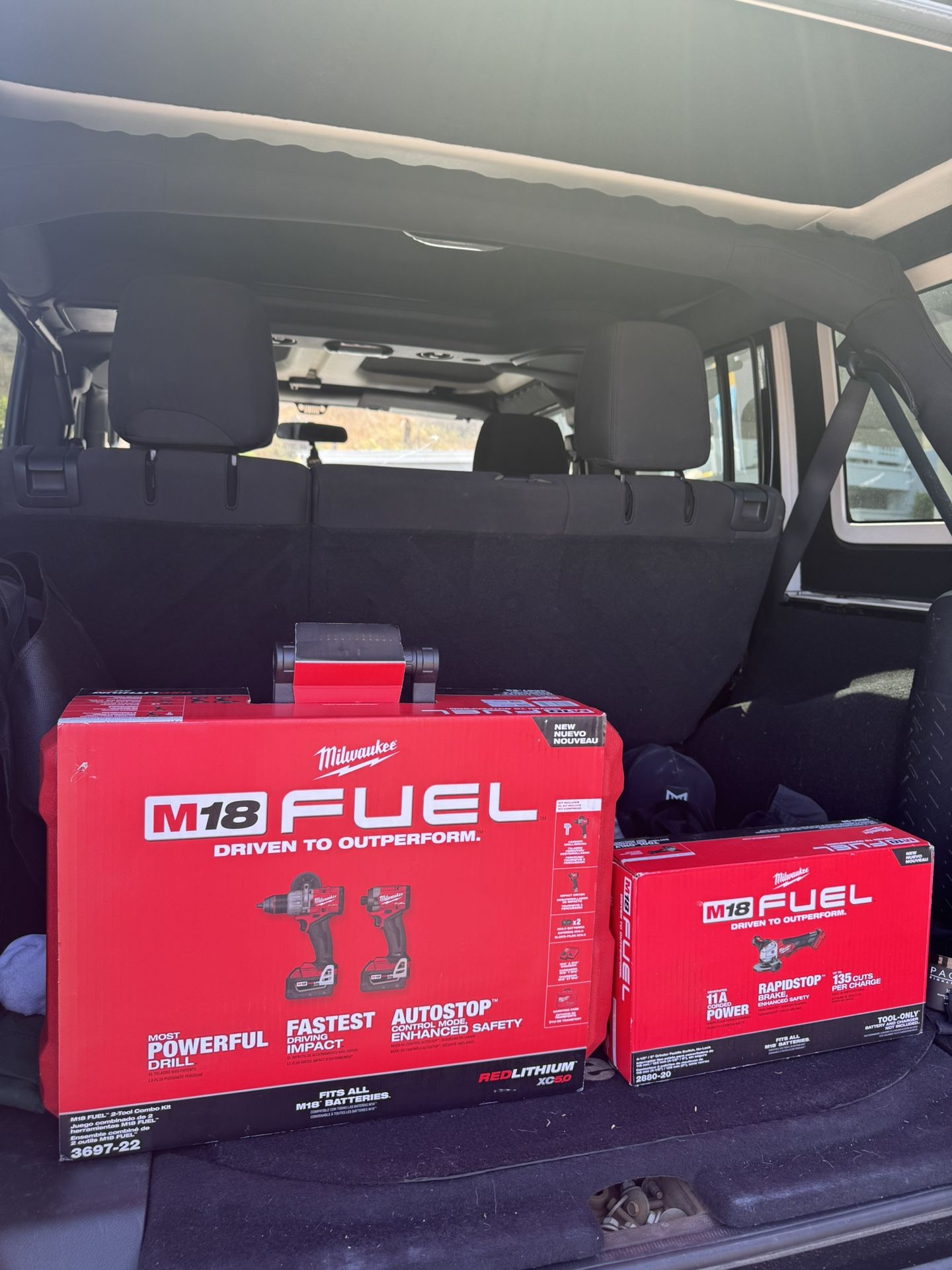 Milwaukee M18 Brushless FUEL Impact, Power Drill, Grinder And Impact Bit Set, X2 5.0 Batteries and Charger