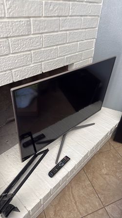 Two flat screen Samsung tvs