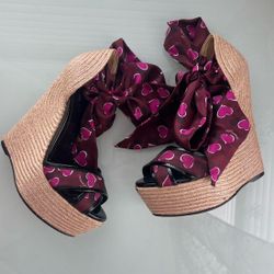 Gucci wedges with heart print strap and bow detail