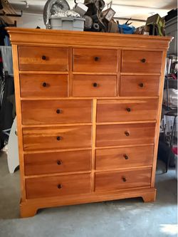 Solid wood 14-drawer dresser/chest of drawers