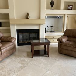 2 Oversized real Leather  Swivel Arm Chairs $350.00 each - $700.00 for Both  - or any reasonable offer will be considered.