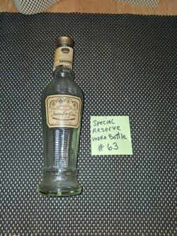 Vintage Smirnoff vodka bottle empty number 63.. all sales final.