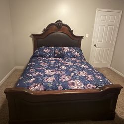 Queen sleigh bed with memory foam mattress and large dresser with mirror
