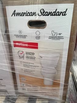 Reliant 12 in. Rough In 2-Piece 1.28 GPF Single Flush Round Toilet with Slow Close Seat in White