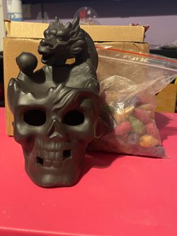 Skull and dragon incense burner with cones