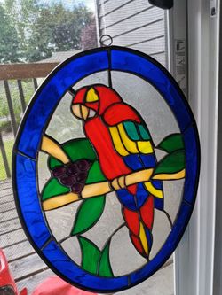 Vintage stained glass parrot