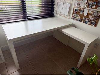 L shaped desk with extendable section