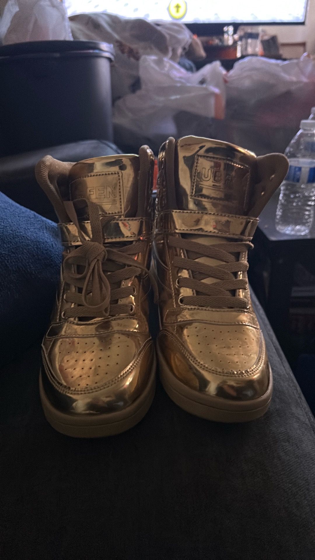 UBFEN Women's and men High Top Sneakers in a metallic gold finish.